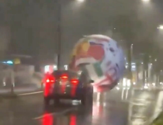 A Giant Inflatable Ball Rolled Through the Streets of San Salvador